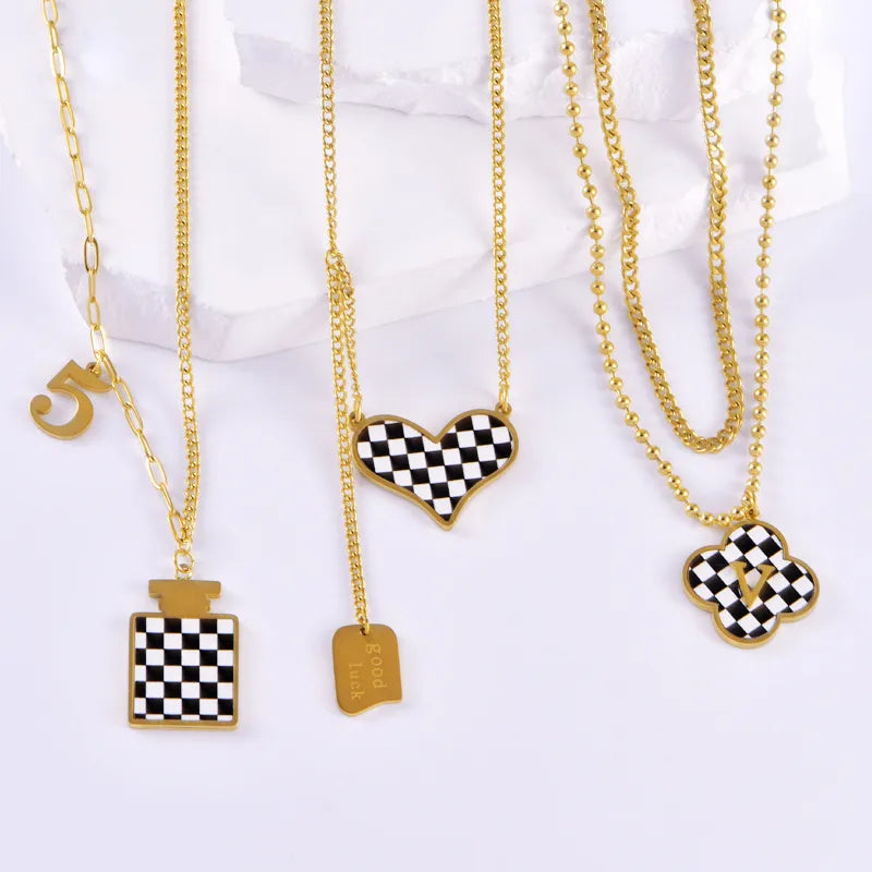 Wholesale Jewelry Casual Simple Style Four Leaf Clover Heart Shape Checkered Titanium Steel Pendant Necklace