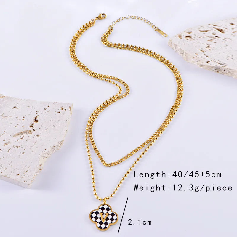 Wholesale Jewelry Casual Simple Style Four Leaf Clover Heart Shape Checkered Titanium Steel Pendant Necklace