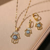 Wholesale Jewelry Copper 18K Gold Plated Zircon Inlaid Devil's Eye Pendant Necklace Earrings Set For Women
