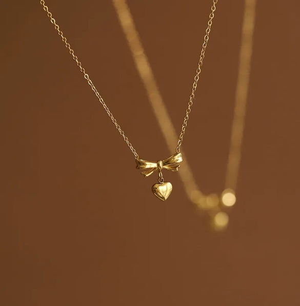 Wholesale Jewelry Elegant Classic Style Heart Shape Solid Color Bow Knot 304 Stainless Steel Titanium Steel 18K Gold Plated Pendant Necklace