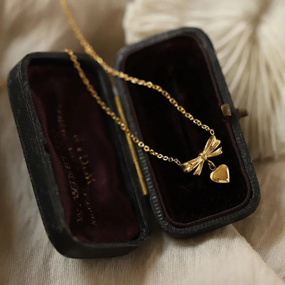 Wholesale Jewelry Elegant Classic Style Heart Shape Solid Color Bow Knot 304 Stainless Steel Titanium Steel 18K Gold Plated Pendant Necklace