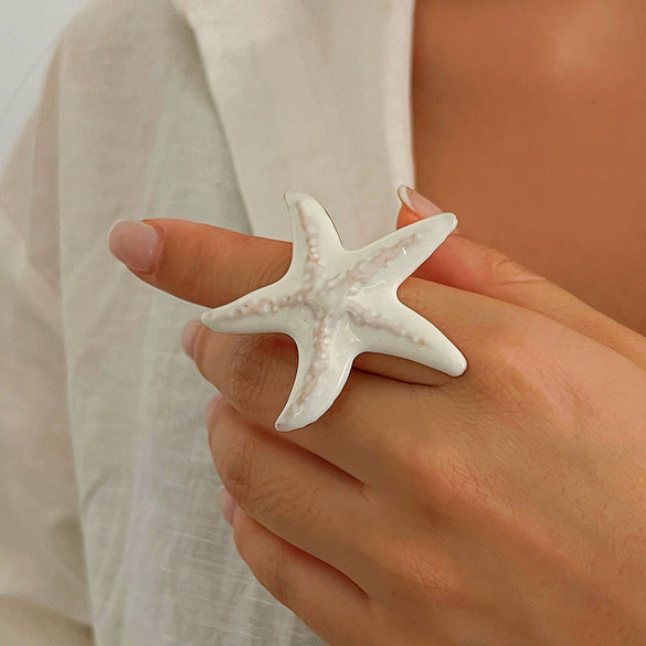 Wholesale Jewelry Exaggerated Iron Imitation Pearls Dripping Oil Fivepetal Flower Threedimensional Starfish Ring Electroplated