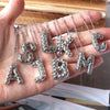 Wholesale Jewelry Hiphop Style Copper Alloy Cross Pendant Water Wave Chain Necklace With Letter Pattern And Electroplating Process