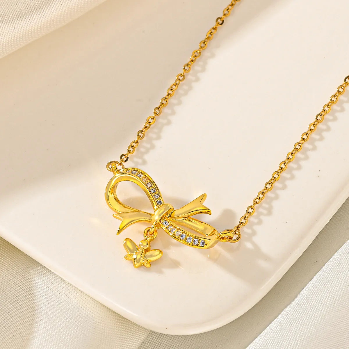 Wholesale Jewelry Japanese Style Bow Knot Titanium Steel Zircon Plating Pendant Necklace