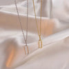 Wholesale Jewelry Light Luxury Geometric Double Ring Pendant 925 Sterling Silver Necklace With 14K Gold Plating And Microinlay Ochain For Women
