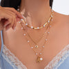 Wholesale Jewelry Metal Starfish Shell Imitation Pearl Necklace Copper Chain Alloy Pendant Electroplating Geometric Style
