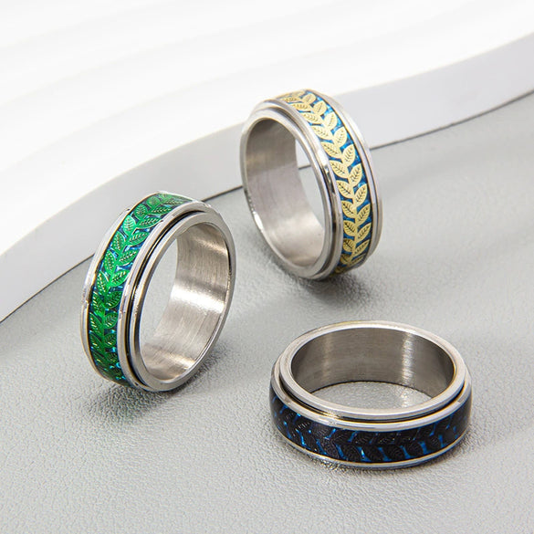 Wholesale Jewelry Olive Leaf Shape Titanium Steel Rotatable Ring With Dripping Oil Treatment And Flower Pattern
