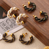 Wholesale Jewelry Retro Geometric Leather Surround Twist Copper Cshaped Earrings Electroplated