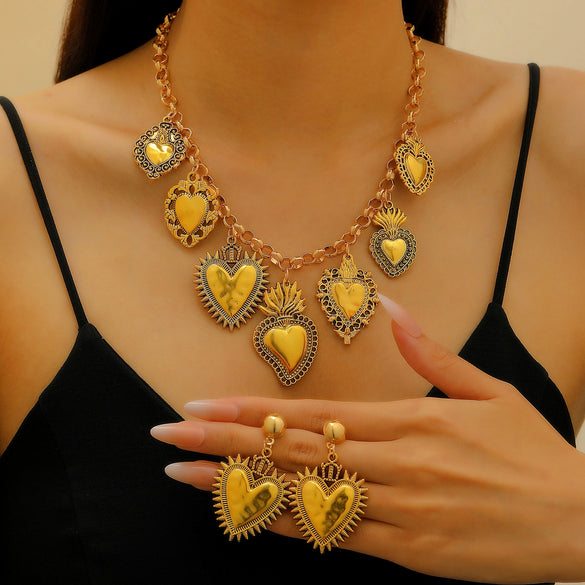 Wholesale Jewelry Retro Personality Sacred Heart Alloy Pendant Necklace And Earrings With Electroplating