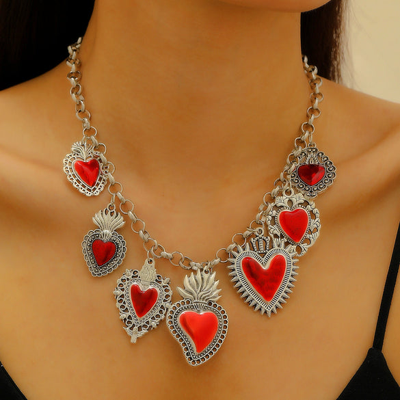 Wholesale Jewelry Retro Personality Sacred Heart Alloy Pendant Necklace And Earrings With Electroplating