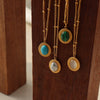 Wholesale Jewelry Retro Style Natural Cat's Eye Stone And Turquoise Titanium Steel Earrings And Necklace With Electroplating