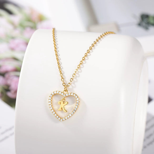 Wholesale Jewelry Simple Geometric Love Hollow Heart Pendant With 26 Letters Copper Zircon Pendant And Stainless Steel Ochain Electroplating Treatment