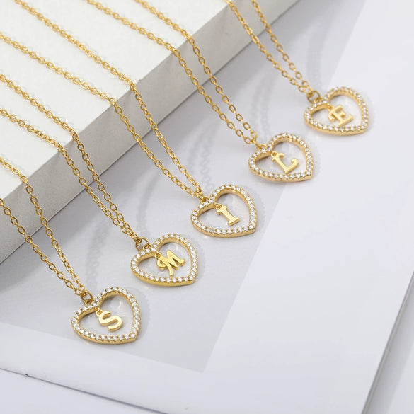 Wholesale Jewelry Simple Geometric Love Hollow Heart Pendant With 26 Letters Copper Zircon Pendant And Stainless Steel Ochain Electroplating Treatment