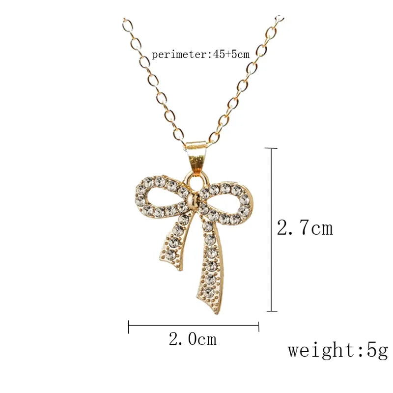 Wholesale Jewelry Simple Style Classic Style Bow Knot Alloy Rhinestones Gold Plated Silver Plated Plating Inlay Pendant Necklace