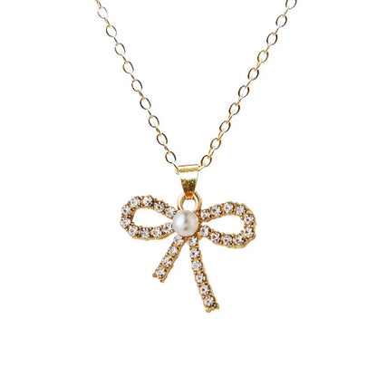 Wholesale Jewelry Simple Style Classic Style Bow Knot Alloy Rhinestones Gold Plated Silver Plated Plating Inlay Pendant Necklace