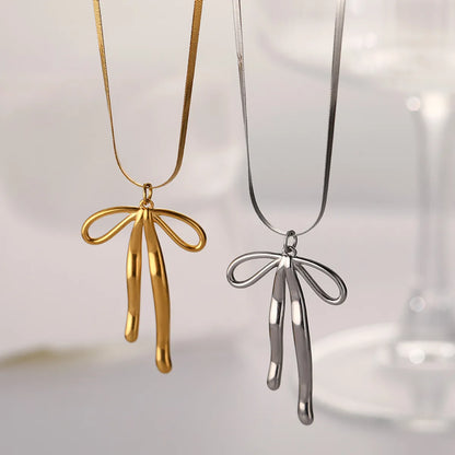 Wholesale Jewelry Simple Style Classic Style Bow Knot Titanium Steel Gold Plated Plating Pendant Necklace