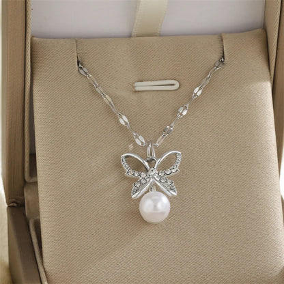 Wholesale Jewelry Simple Style Classic Style Cross Flower Butterfly 201 Stainless Steel Imitation Pearl Zinc Alloy Rhinestones 18K Gold Plated Enamel Diamond Pendant Necklace