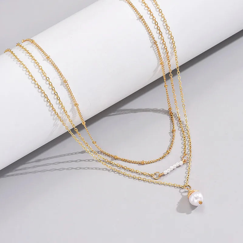 Wholesale Jewelry Simple Style Classic Style Solid Color Alloy Gold Plated Plating Layered Necklaces