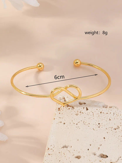 Simple Style Cross Heart Shape Knot Alloy Iron Plating Women'S Bangle