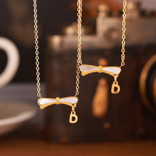 Wholesale Jewelry Simple Style Letter Bow Knot 304 Stainless Steel Shell 18K Gold Plated Plating Inlay Pendant Necklace