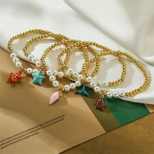 Simple Style Shiny Starfish Fish Tail Zircon Imitation Pearl Copper Wholesale Bracelets