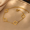 Wholesale Jewelry Suit With Hollow Four Leaf Clover Ring And Earrings In Fashion Style Made Of Stainless Steel With Flower Pattern And Electroplating Treatment