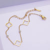 Wholesale Jewelry Suit With Hollow Four Leaf Clover Ring And Earrings In Fashion Style Made Of Stainless Steel With Flower Pattern And Electroplating Treatment