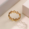Wholesale Jewelry Suit With Hollow Four Leaf Clover Ring And Earrings In Fashion Style Made Of Stainless Steel With Flower Pattern And Electroplating Treatment