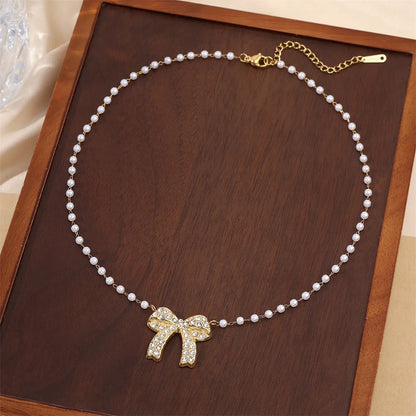 Wholesale Jewelry Sweet IG Style Bow Knot 304 Stainless Steel Pearl Zircon Beaded Inlay Necklace