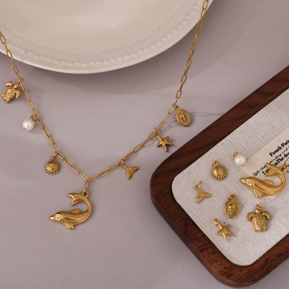 Wholesale Jewelry Titanium Steel Stainless Steel Animal Zodiac Star Shape Fishtail Turtle Pearl Starfish Dolphin Pendant Necklace With Electroplating Sweet Natural Style
