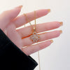 Wholesale Jewelry Titanium Steel Women's Light Luxury Clover Necklace With Real Gold Electroplated And Diamond And Flower Pendant