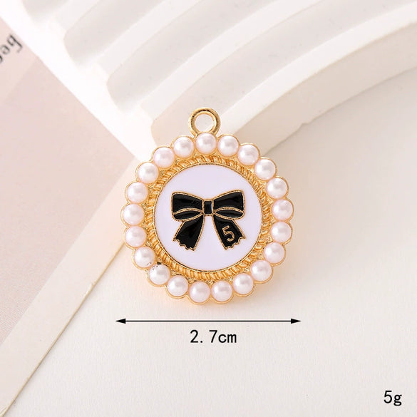 Wholesale Jewelry Zinc Alloy Love Bow Pendant Accessories With Hirback Pattern And Dripping Oil Design For Women