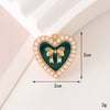 Wholesale Jewelry Zinc Alloy Love Bow Pendant Accessories With Hirback Pattern And Dripping Oil Design For Women