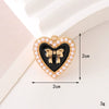 Wholesale Jewelry Zinc Alloy Love Bow Pendant Accessories With Hirback Pattern And Dripping Oil Design For Women