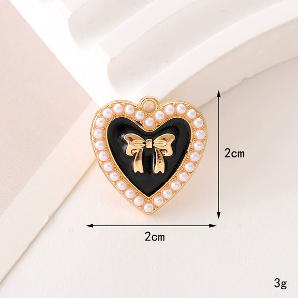 Wholesale Jewelry Zinc Alloy Love Bow Pendant Accessories With Hirback Pattern And Dripping Oil Design For Women