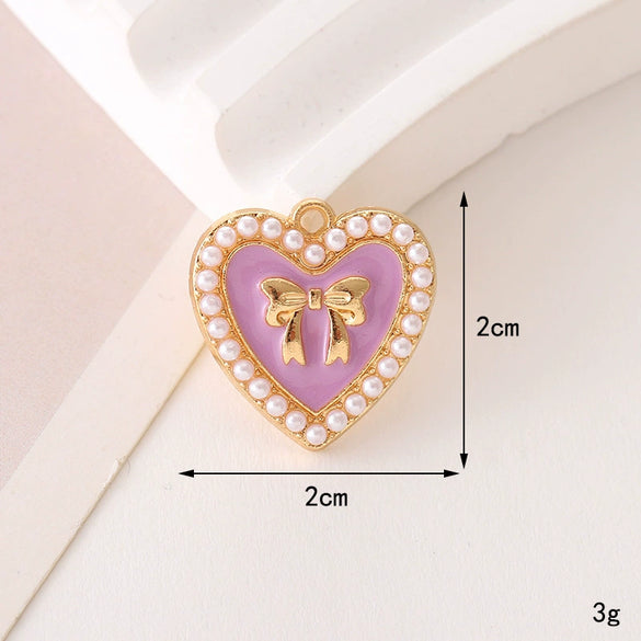 Wholesale Jewelry Zinc Alloy Love Bow Pendant Accessories With Hirback Pattern And Dripping Oil Design For Women