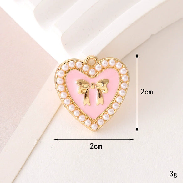 Wholesale Jewelry Zinc Alloy Love Bow Pendant Accessories With Hirback Pattern And Dripping Oil Design For Women