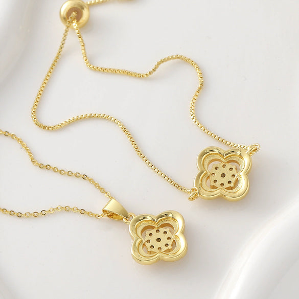 Wholesale 18K Gold Plated Copper Diamondencrusted Fourleaf Clover Necklace And Bracelet Jewelry Set For Women