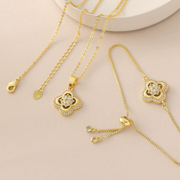 Wholesale 18K Gold Plated Copper Diamondencrusted Fourleaf Clover Necklace And Bracelet Jewelry Set For Women