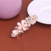 Wholesale Ladies Alloy Flower Rhinestone Cat's Eye Top Clip Hairpin Jewelry With Electroplating