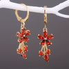 Wholesale Ladies Copper Inlaid Zircon Flower Earrings