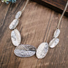 Wholesale Ladies Enamel Geometric Starfish Zinc Alloy Necklace With Paint Oil Processing And Irregular Flower Design