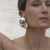 Wholesale Ladies Exaggerated Geometric Stainless Steel Button Shaped Electroplated Earrings