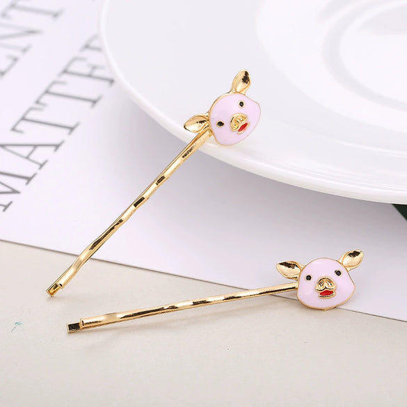 Wholesale Ladies Fashion Alloy Hair Clips In Cartoon Style With Piglet Design And Electroplating Treatment