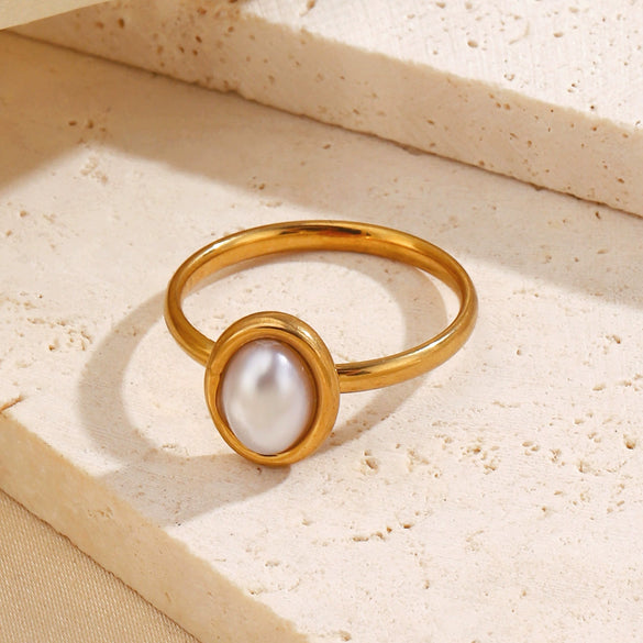 Wholesale Ladies Geometric Oval Stainless Steel Ring With Imitation Pearl Inlay And Electroplating
