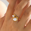 Wholesale Ladies Retro Hip Hop Style Stainless Steel And Pearl Open Adjusting Geometric Ring With Electroplating
