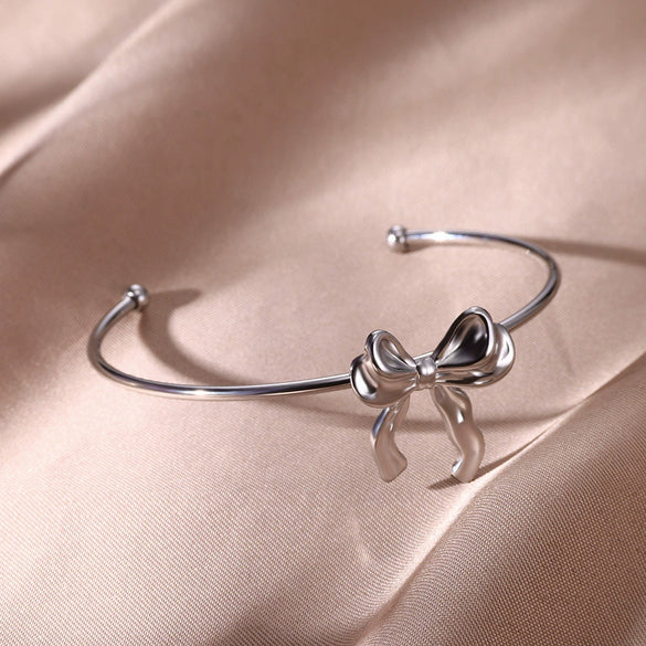 Wholesale Ladies Stainless Steel Bow Electroplated Bracelet With Plants And Flowers Style