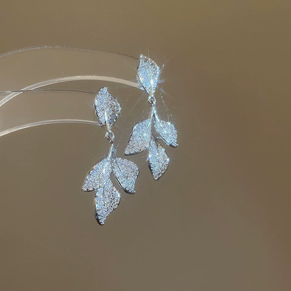 Wholesale Light Luxury French Retro Style Copper Leaf Zirconia Tassel Earrings For Women
