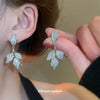 Wholesale Light Luxury French Retro Style Copper Leaf Zirconia Tassel Earrings For Women