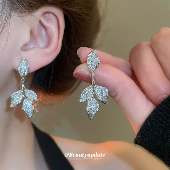 Wholesale Light Luxury French Retro Style Copper Leaf Zirconia Tassel Earrings For Women